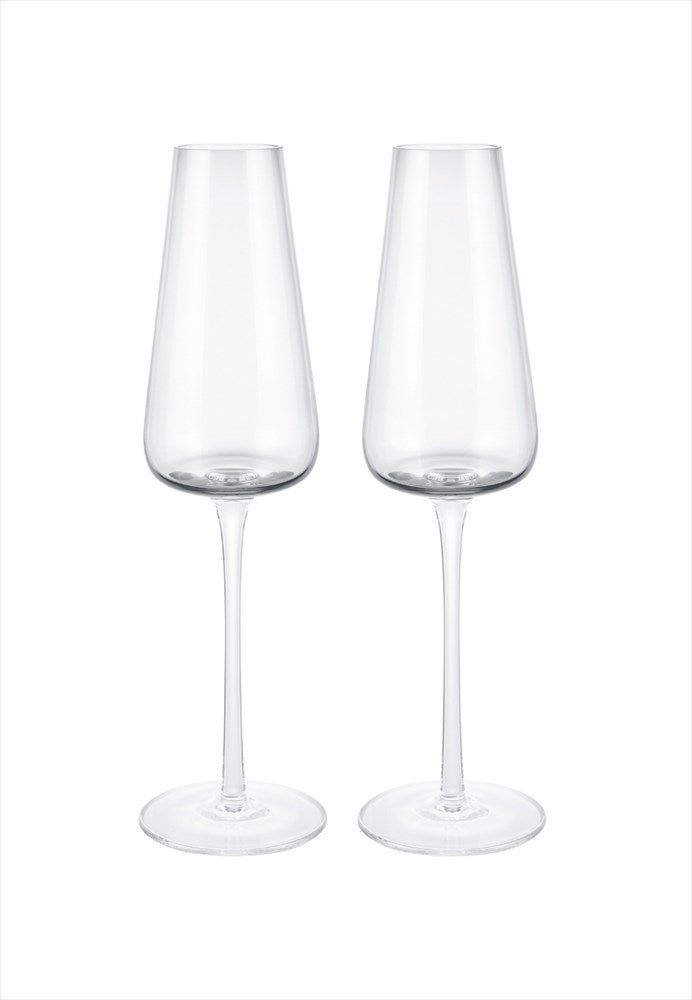 Belo champagneglas 2-pack. Volym: 20 cl. Mått: H24,5 cm / D6 cm. Material: Glas (munblåst). Designer: Frederike Martens. Diskmaskinssäker: Ja. Färg: Klar