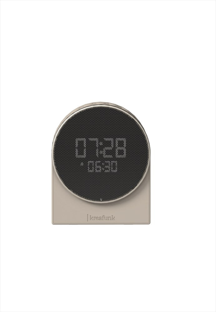 Trådlös väckarklocka med wake-up light, högtalare och sömnljud. Mått: L9 cm / B4,6 cm / H11 cm. Material: 100% återvunnen ABS-plast (GRS), metall, silikon. Färg: Ivory Sand