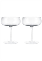Belo champagnekupa 2-pack. Volym: 20 cl. Mått: H14 cm / D11 cm. Material: Glas (munblåst). Designer: Frederike Martens. Diskmaskinssäker: Ja. Färg: Klar