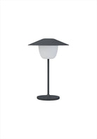 Ani Mini LED-lampa. Bärbar trådlös bordslampa. 3 ljusnivåer. Mått: Ø14,5 / H21,5 cm. Material: Aluminium (pulverlackerad). Färg: Magnet