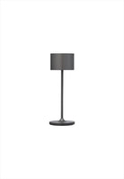 Farol Mini LED-lampa. Bärbar trådlös bordslampa. 3 ljusnivåer. Mått: Ø7 / H19,5 cm. Material: Aluminium (pulverlackerad). Färg: Gun Metal