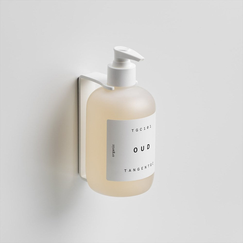 Väggfäste till tvålflaska. Svenskt rostfritt stål.